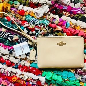 Shimmery Cream Coach Wristlet